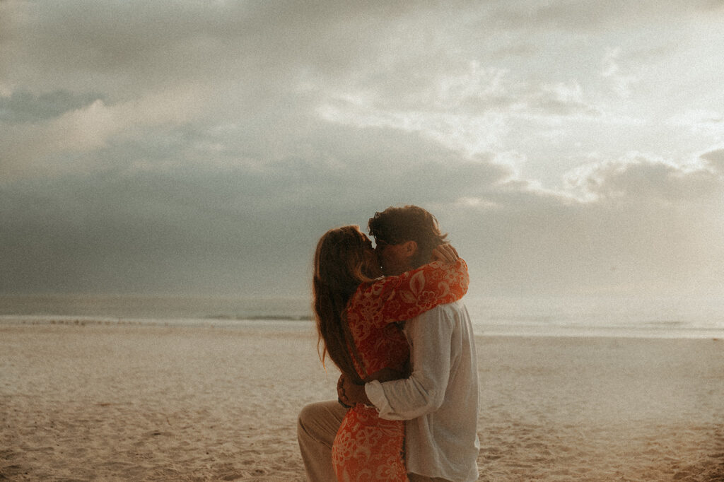 stunning couple during their beach proposal