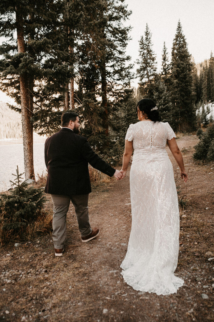 couple holding hands during their elopement session 