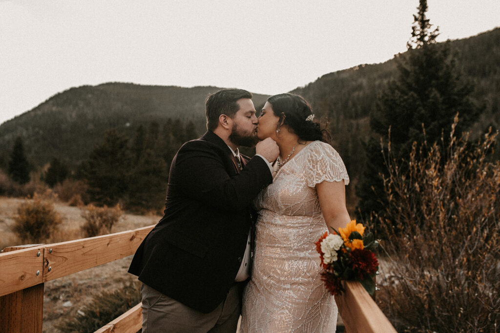 couple kissing at their adventurous elopement 