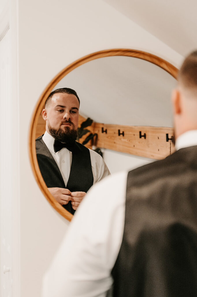 groom getting ready for the ceremony