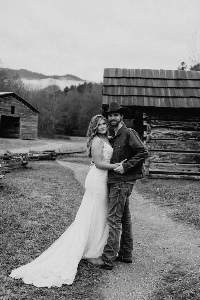 b&w photo of the couple during their wedding anniversary session at Cade Cove