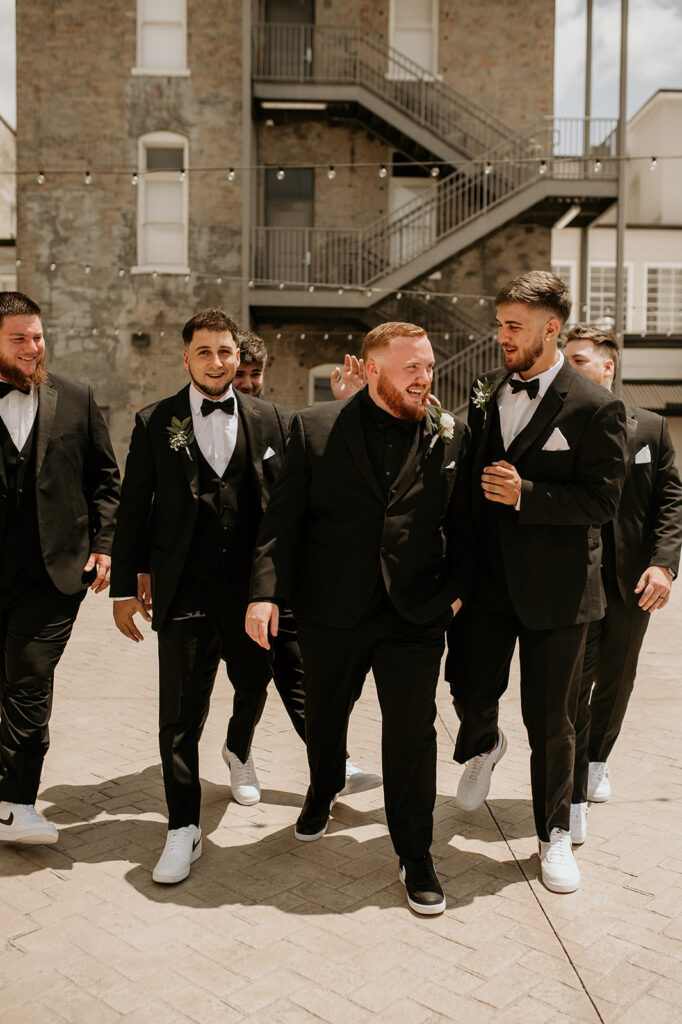 groom and his friends heading to the elegant wedding day 