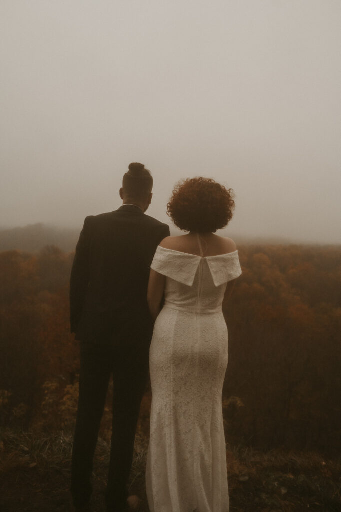 couple looking at the smoky mountain 