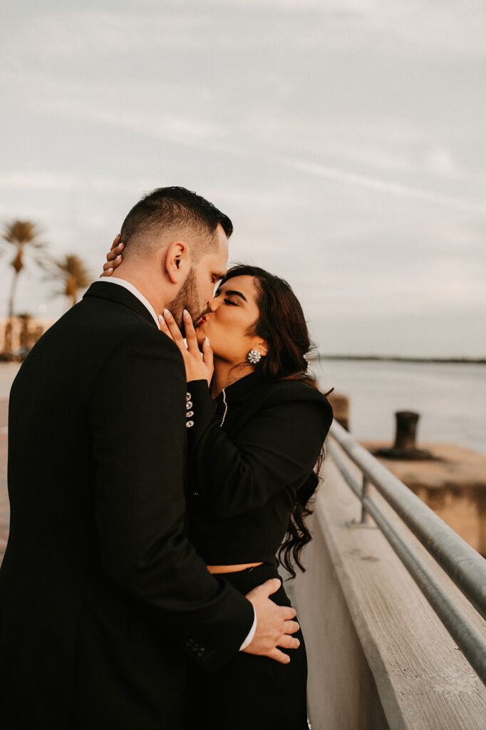 portrait of the couple kissing at golden hour 