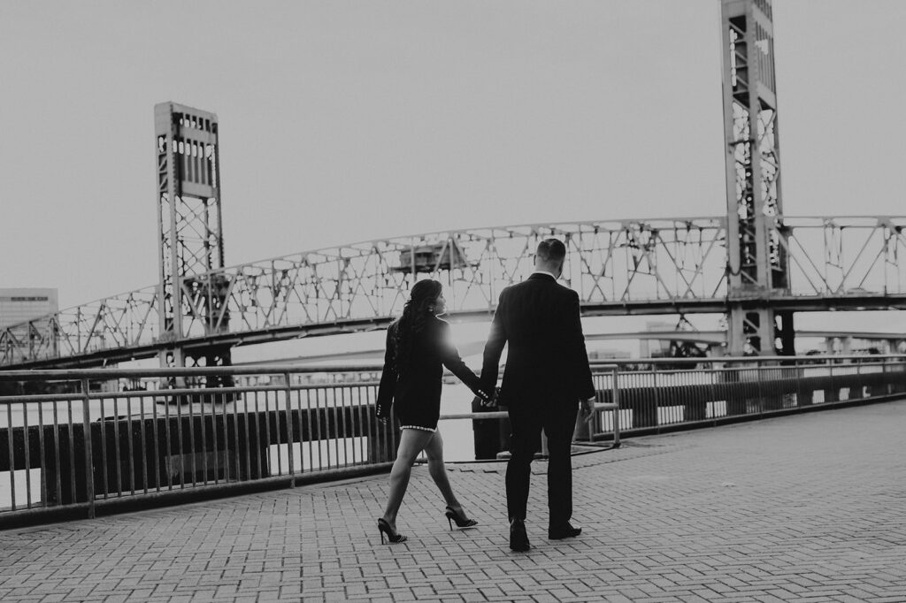 b&w portrait of the newly engaged couple at their timeless downtown engagement session