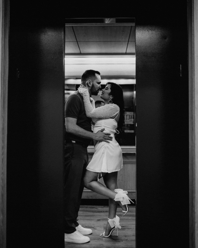 cute portrait of the couple in an elevator