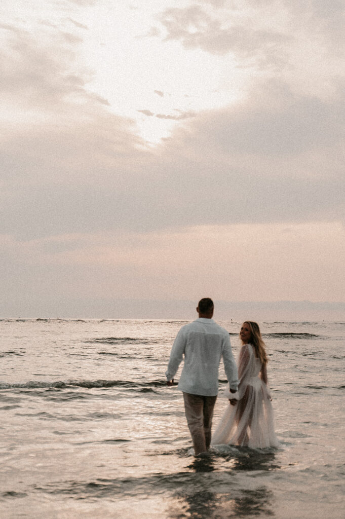 couple walking around the beach