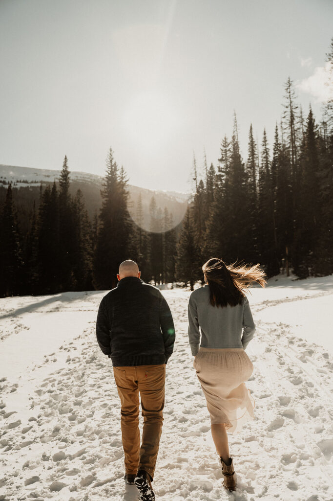 couple walking during their engagement session 