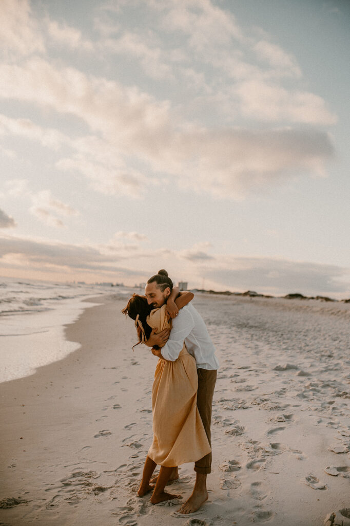couple hugging at the beach
