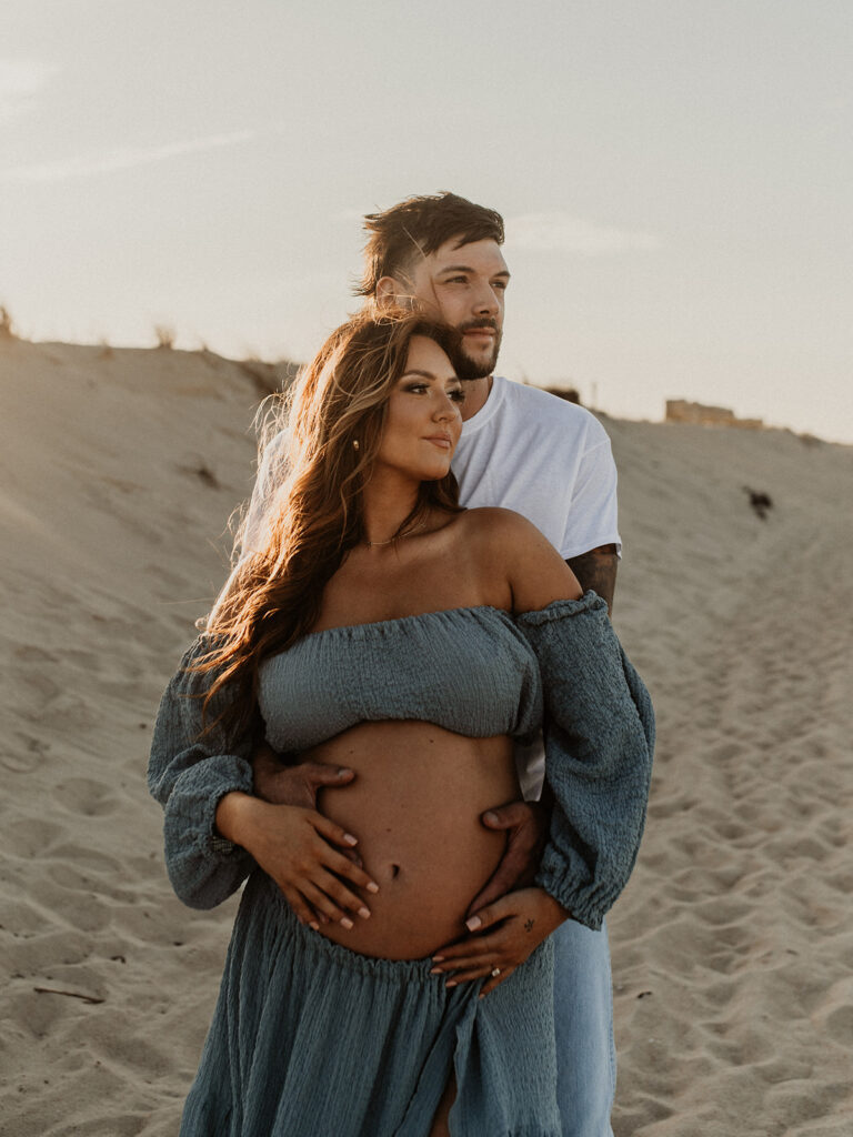 gorgeous couple at their Beautiful Beach Maternity Session 