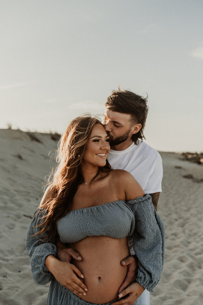 happy couple hugging during their photoshoot