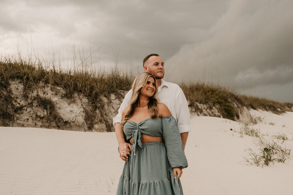 cute couple at their Romantic Beach Engagement Session in St. Augustine, FL