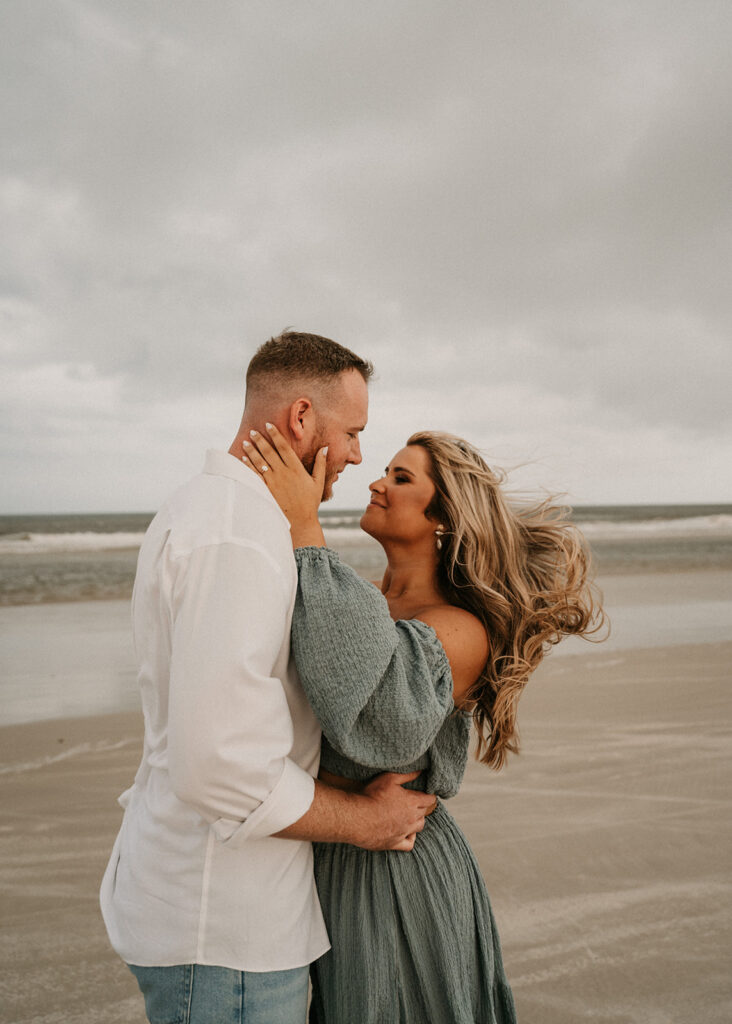 in love couple looking at each other during their photoshoot