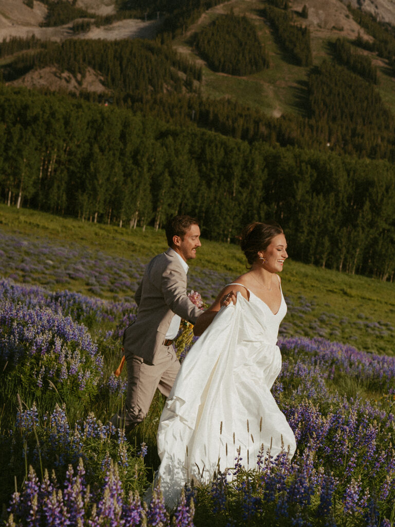 cute couple running during their elopement photoshoot