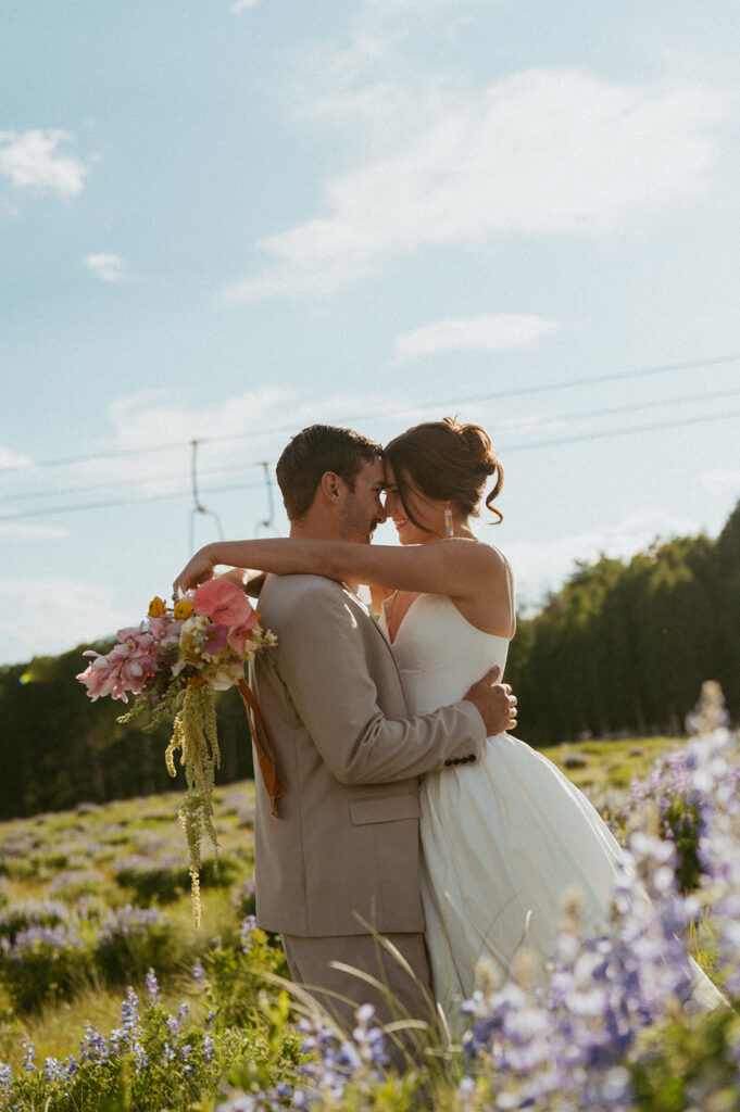 picture of the bride and groom looking at each other 