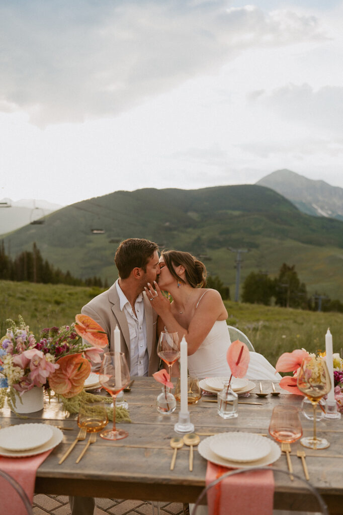 bride kissing the groom on the cheek