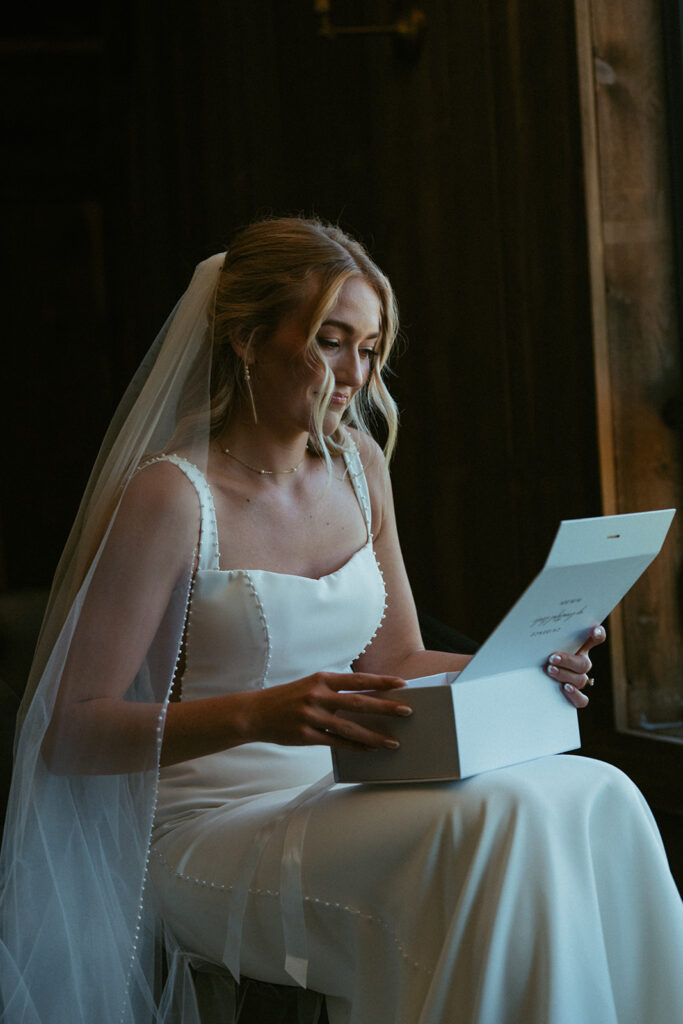 bride opening her wedding present