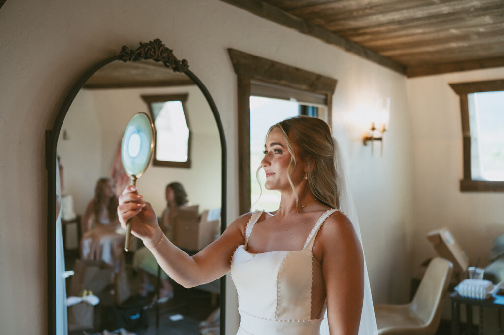 bride before heading to her classy western wedding ceremony