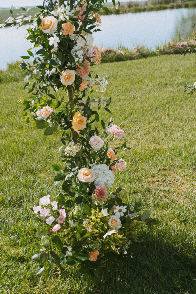 colorful wedding florals at the ceremony 