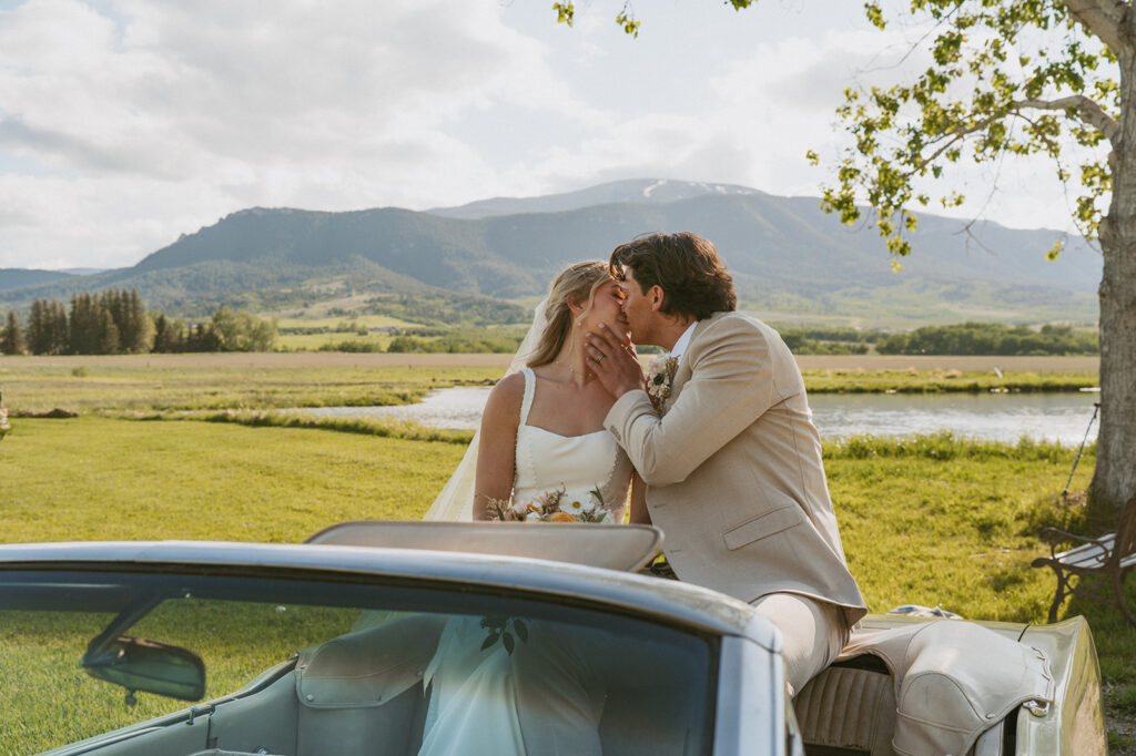 picture of the bride and groom kissing