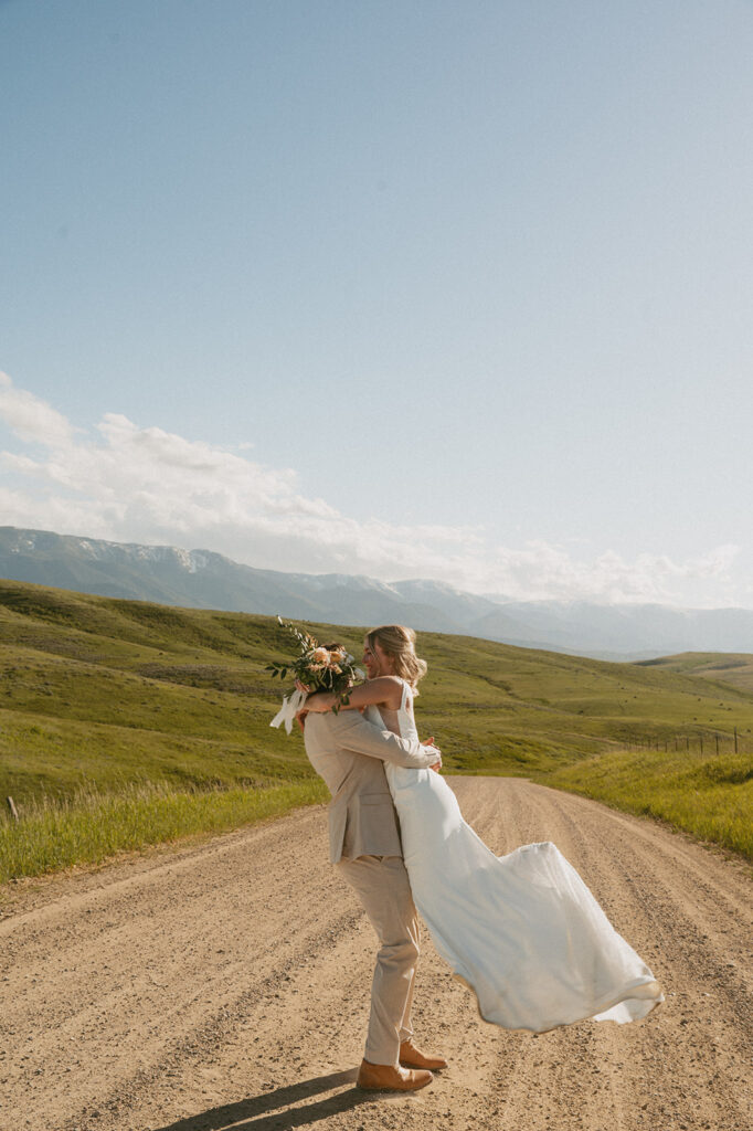 newlyweds dancing at their classy western wedding during their photoshoot