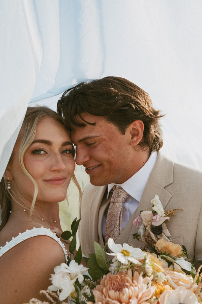 cute picture of the groom looking at the bride