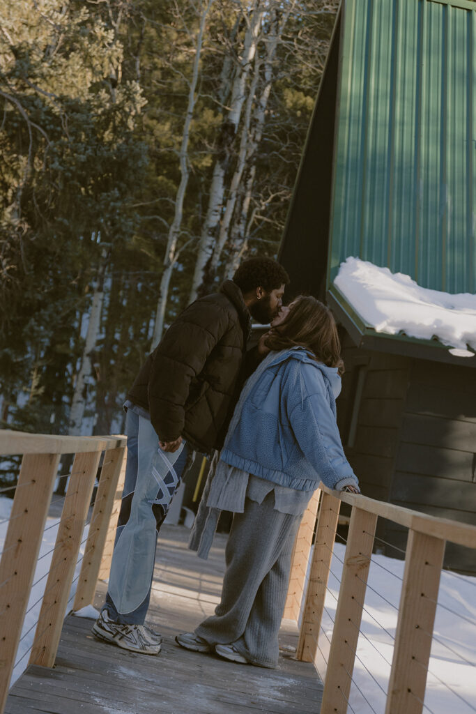 cute couple kissing at their dream photoshoot