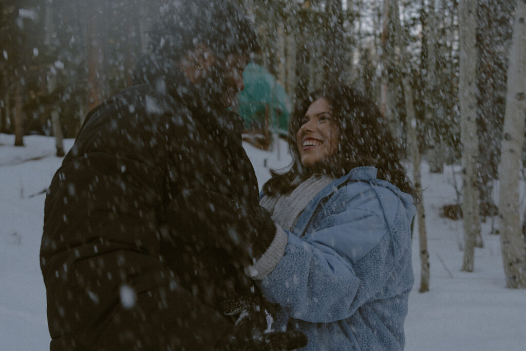 couple dancing at their cozy couple session