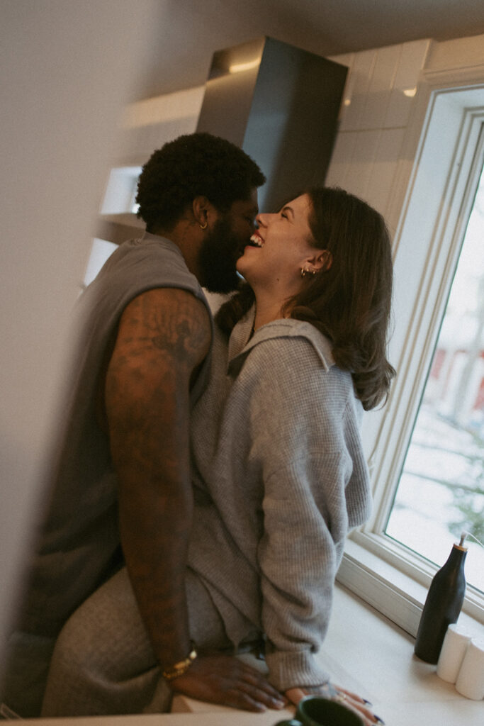 boyfriend kissing his girlfriend on the cheek