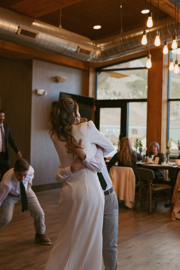cute picture of the newlyweds dancing at their reception