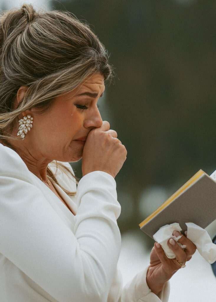 bride emotional reading her vows