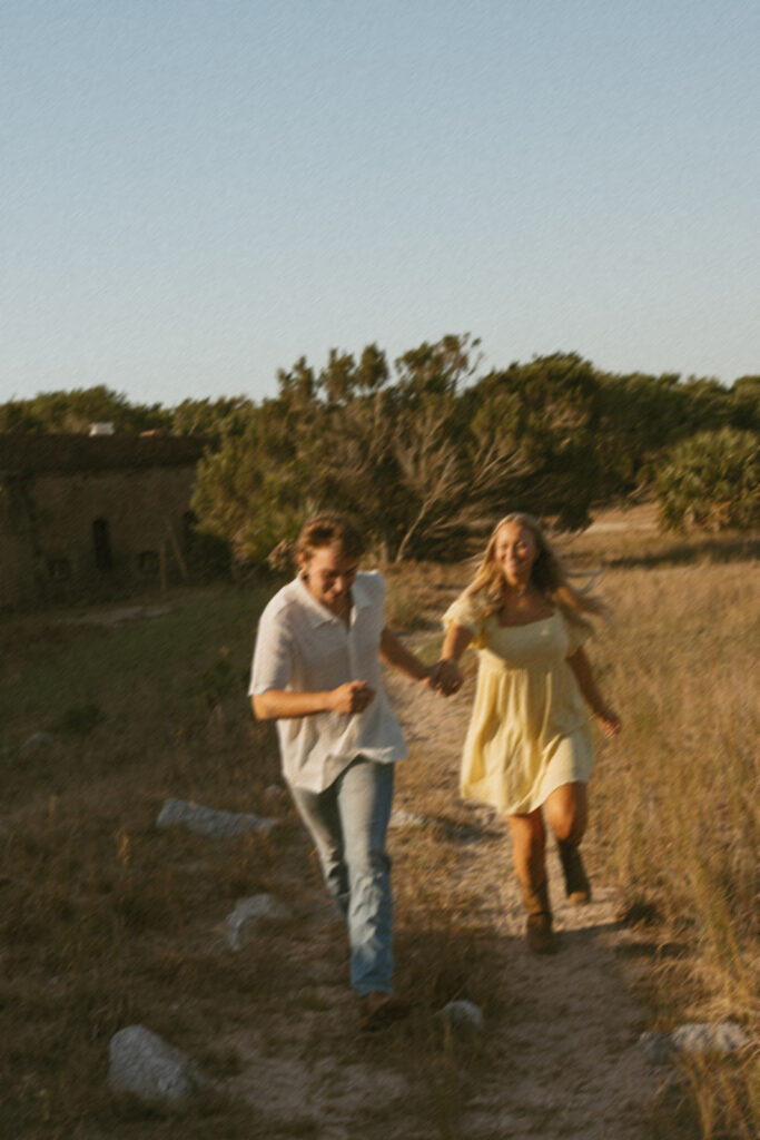couple playing during their session in florida