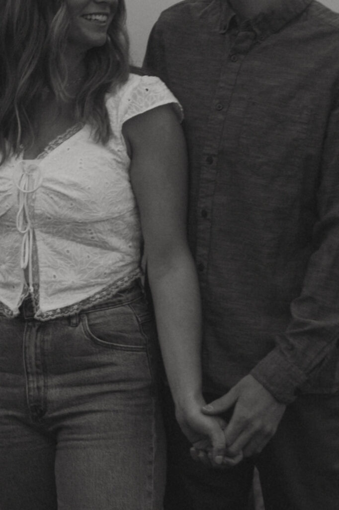 couple holding hands during their session