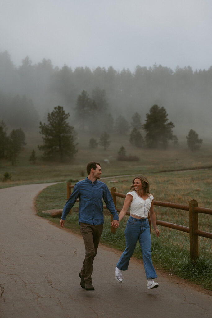 cute couple playing during their dream photoshoot in colorado