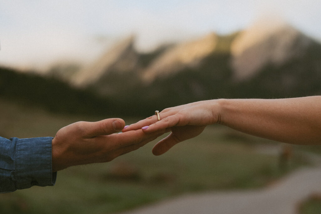 cute couple holding hands during their dream colorado photoshoot