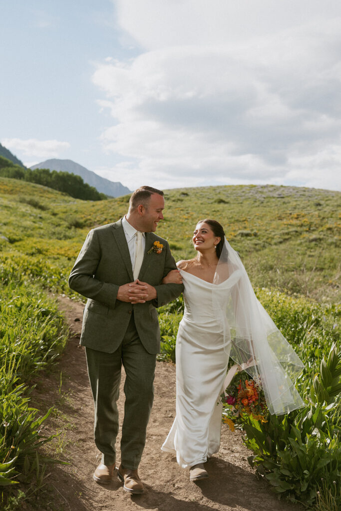 cute couple walking around their dream elopement location
