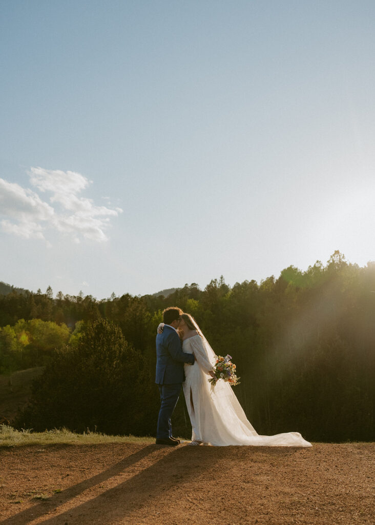 bride and groom kissing after their cermeony