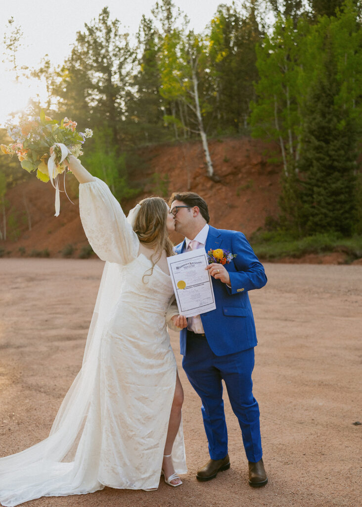 cute picture of the newlyweds kissing