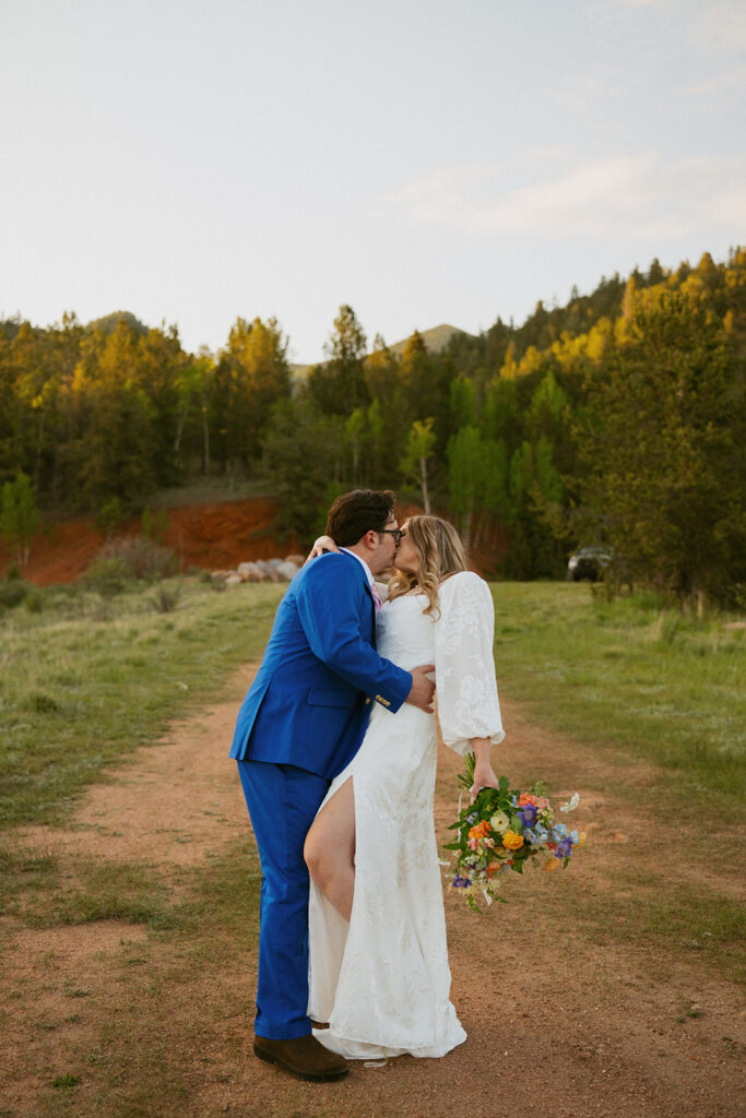 portrait of the newlyweds kissing