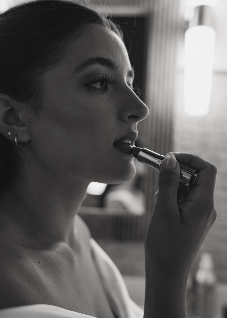 bride putting on her makeup before her private vows