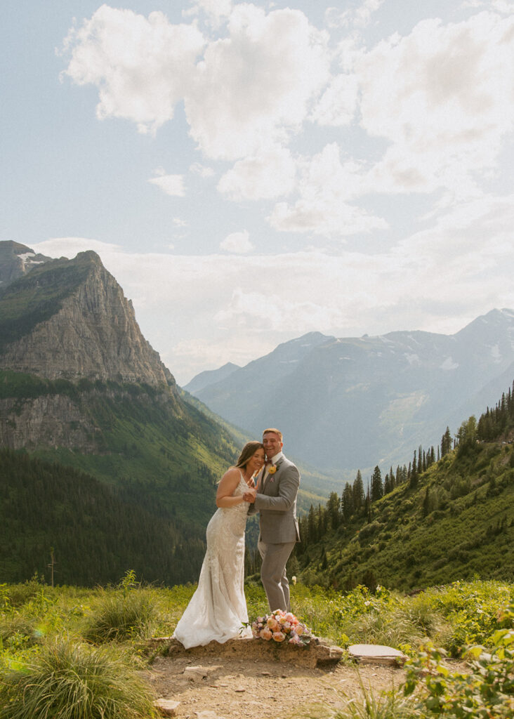 cute picture of the bride and groom smiling at the camera