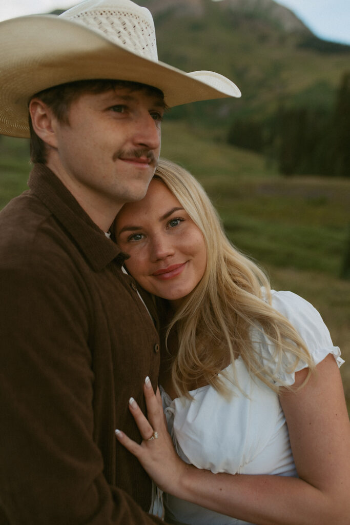 couple posing for the camera during their photoshoot
