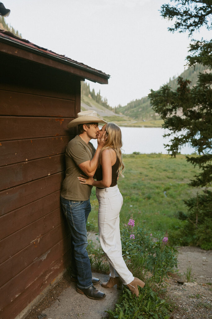 cute picture of the newly engaged couple kissing
