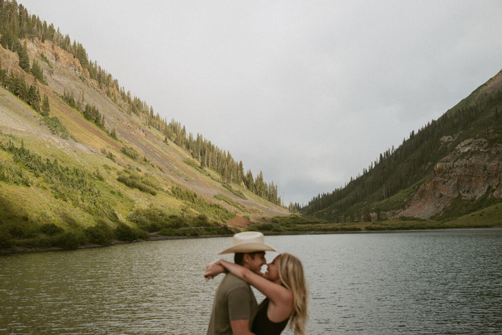 portrait of the couple kissing during their photoshoot