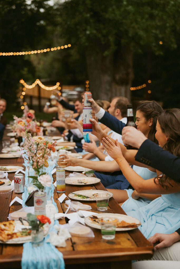 guests celebrating the newlyweds with champagne 