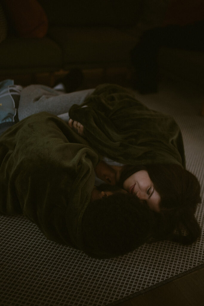 couple hugging during their winter photoshoot in colorado