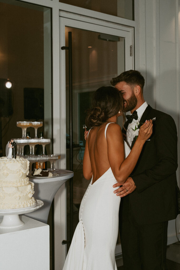 Couple kissing at their wedding reception party