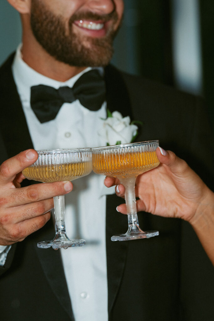 Couple celebrating their wedding with champagne