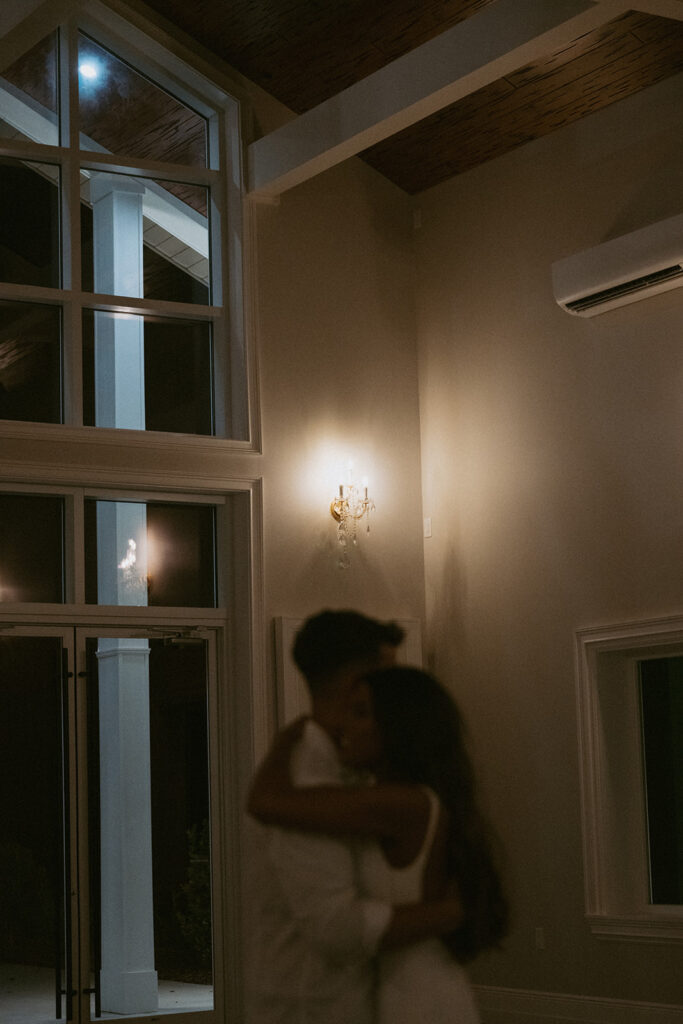 Cute picture of the newly married couple hugging