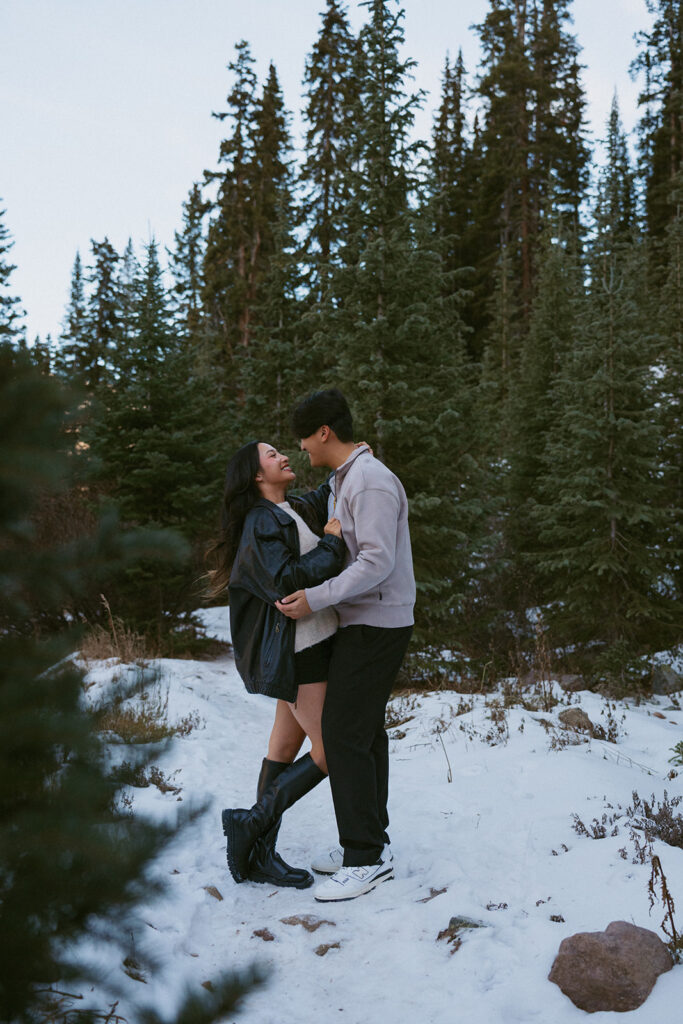 cute portrait of the couple kissing during their photoshoot